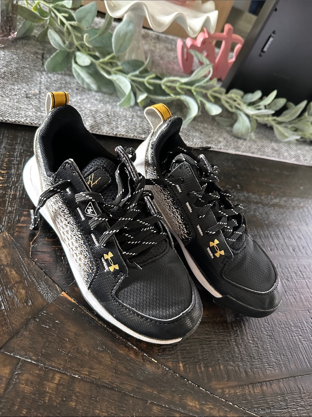 Under Armour Black & Gold Boys’ Cleats